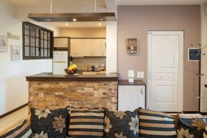 A kitchen or kitchenette at Villa Red Porto Cheli