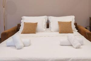 A bed or beds in a room at Villa Red Porto Cheli