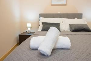 A bed or beds in a room at Villa Red Porto Cheli