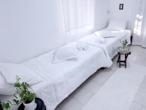 Postel nebo postele na pokoji v ubytování Anticlea II + 37 fotografií