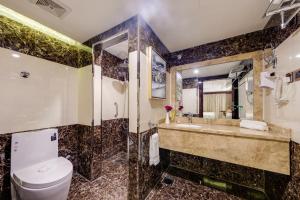 Koupelna v ubytování Al Ertiqaa Hotel