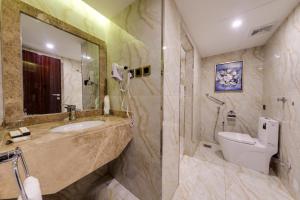 Koupelna v ubytování Al Ertiqaa Hotel