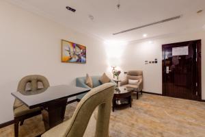 Posezení v ubytování Al Ertiqaa Hotel