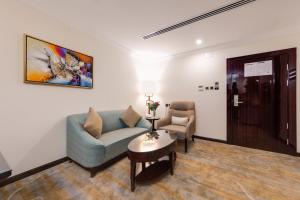 Posezení v ubytování Al Ertiqaa Hotel