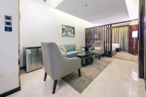 Posezení v ubytování Al Ertiqaa Hotel