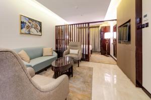 Posezení v ubytování Al Ertiqaa Hotel