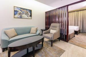 Posezení v ubytování Al Ertiqaa Hotel