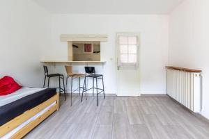 Kuchnia lub aneks kuchenny w obiekcie Cénoslocs Bondy - Paris à vos pieds pour 4 personnes avec Jardin & Wifi