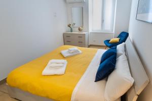Postel nebo postele na pokoji v ubytování Casa vacanza Valentina - Downtown Bergamo