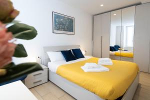 Postel nebo postele na pokoji v ubytování Casa vacanza Valentina - Downtown Bergamo