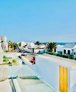 a balcony with a view of a city at CIH Apartments in Puerto del Carmen
