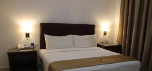 Letto o letti in una camera di Mirage Hotel