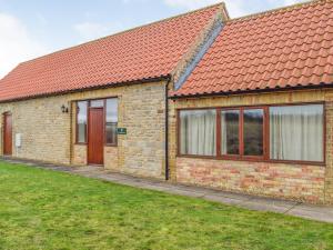 a brick house with a red roof at Kingfisher - Uk42520 in Aldwincle Saint Peter