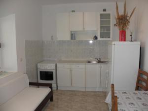 Kuchnia lub aneks kuchenny w obiekcie House Lumbarda (876)