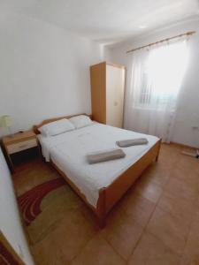 Postel nebo postele na pokoji v ubytování Apartment in Povlja with sea view, balcony, air conditioning WiFi 4936-1 -2 -3