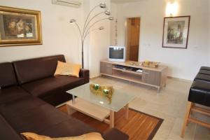 Telewizja i/lub zestaw kina domowego w obiekcie Guesthouse Rovinj (4285)
