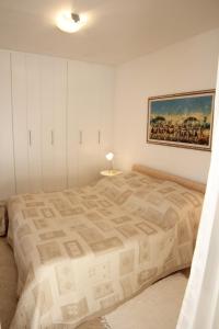 Łóżko lub łóżka w pokoju w obiekcie Guesthouse Rovinj (4285)