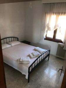 A bed or beds in a room at great first floor appartment with view