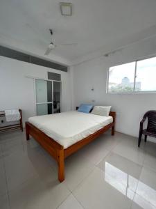 Postelja oz. postelje v sobi nastanitve Hotel Remember