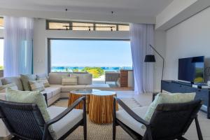 TV a/nebo společenská místnost v ubytování Manta Cove by Horizon Holidays