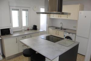Kuchyň nebo kuchyňský kout v ubytování Apartamento Calle Huelva by CasaTuristica + 16 fotografií