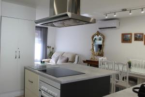 Kuchnia lub aneks kuchenny w obiekcie Apartamento Calle Huelva by CasaTuristica