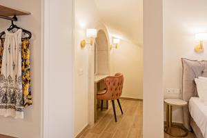 A bed or beds in a room at Casa Del Balsamo