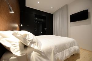 TV a/nebo společenská místnost v ubytování Albergo Ristorante Trieste Boves
