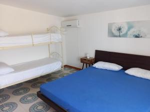 Ένα ή περισσότερα κρεβάτια σε δωμάτιο στο Apartment in Apulia near Ionian Sea Beach