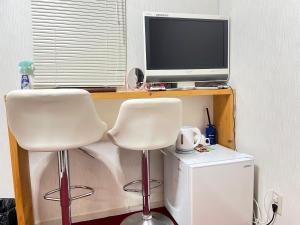 TV a/nebo společenská místnost v ubytování 自遊人の宿
