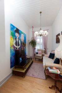TV a/nebo společenská místnost v ubytování Casa Dourada