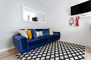 Μια τηλεόραση ή/και κέντρο ψυχαγωγίας στο Apartamentos da Cidade