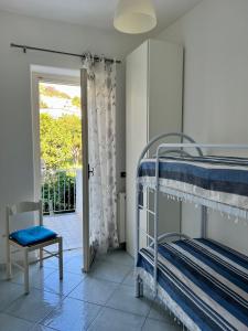 Postel nebo postele na pokoji v ubytování Casa Mia
