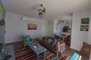 Posezení v ubytování Lagoon View Penthouse - El Gouna Paradise Escape