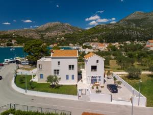 an aerial view of a house with mountains in the background at Luxury Seaview Apartment - Sole in Slano
