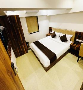 Postel nebo postele na pokoji v ubytování Hotel Hilton Suites