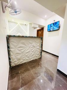 TV a/nebo společenská místnost v ubytování Hotel Hilton Suites