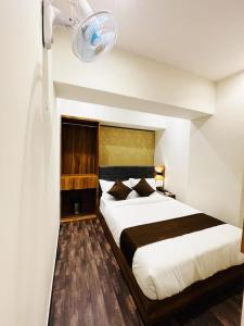 Postel nebo postele na pokoji v ubytování Hotel Hilton Suites