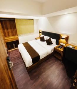 Postel nebo postele na pokoji v ubytování Hotel Hilton Suites