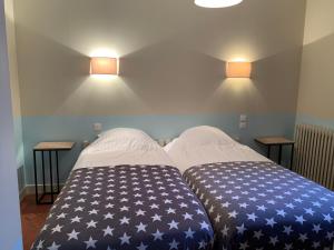 Łóżko lub łóżka w pokoju w obiekcie Charmant appartement jardin/parking privé 4 personnes