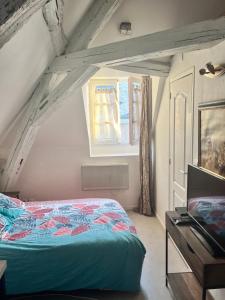 Posteľ alebo postele v izbe v ubytovaní LE PACIFIC - Appartement spacieux centre ville