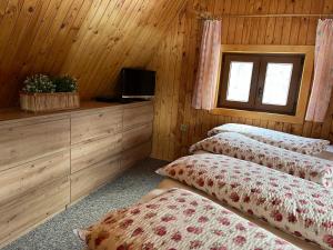 Postel nebo postele na pokoji v ubytování Ubytování u hrádečku