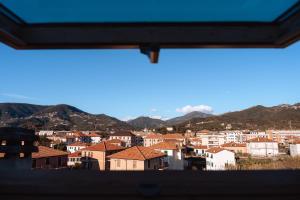 a view of a city from a window at LA SOFFITTA DEI SOGNI 010059-LT-2481 in Sestri Levante