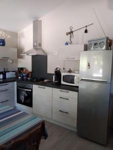 Photo de la galerie de l'établissement La maison bleue, à Grane