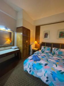 Postel nebo postele na pokoji v ubytování Riviera Bay Resort Condominium