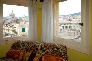 A bed or beds in a room at Torre Ducale Dimora Storica