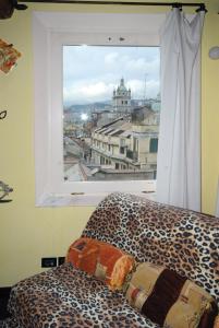 A bed or beds in a room at Torre Ducale Dimora Storica