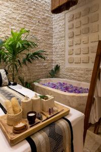 Postel nebo postele na pokoji v ubytování Olbil Hotel Boutique