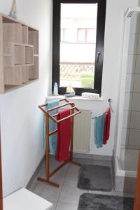 a bathroom with a towel rack and a sink at Im Herzen Deutschlands entspannen in Heilbad Heiligenstadt