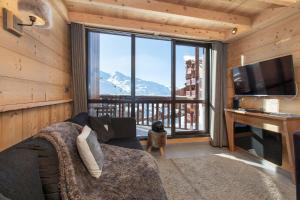 TV a/nebo společenská místnost v ubytování Val Thorens - Cosy Duplex avec Vue Silveralp 338
